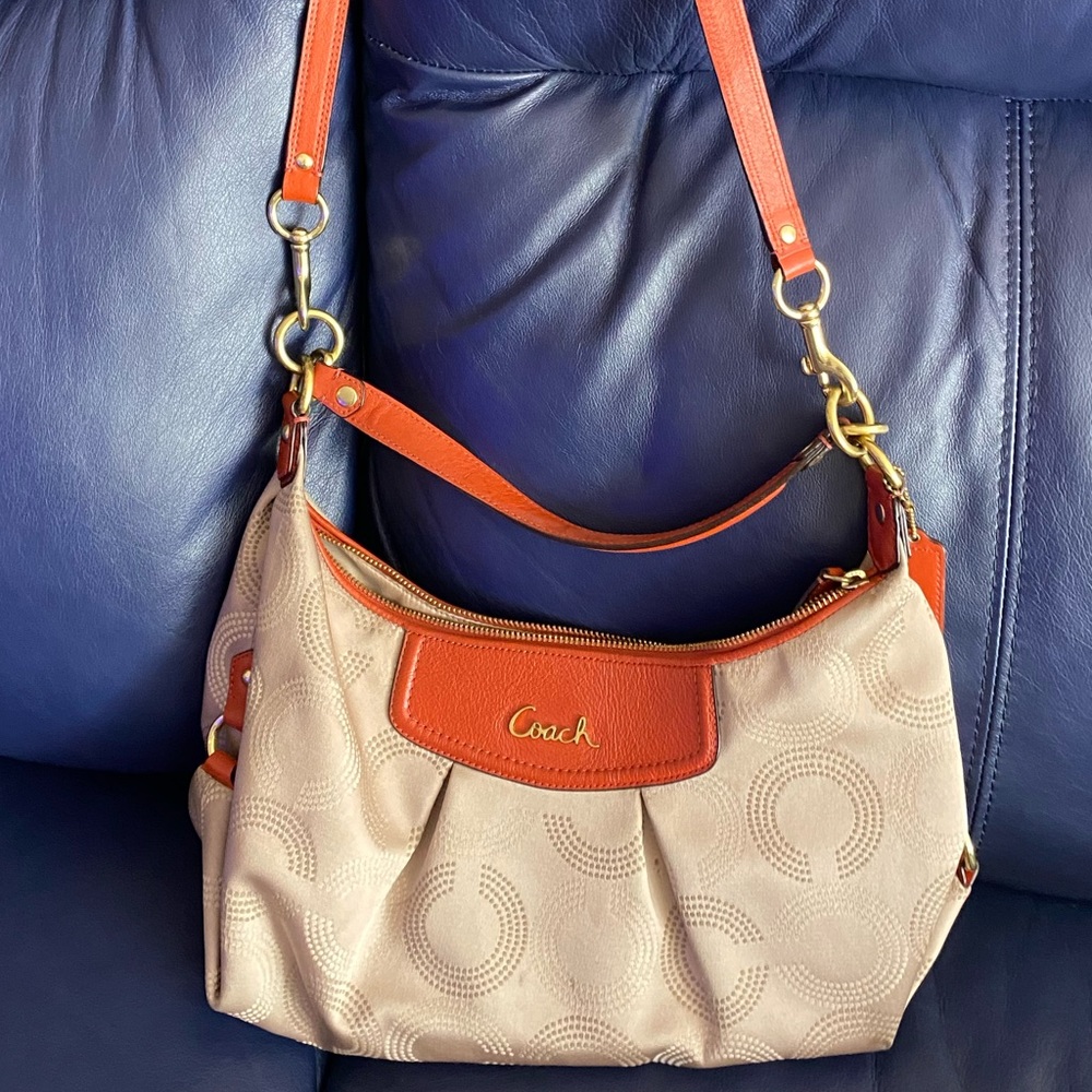 Coach beige nylon signature hobo with orange trim